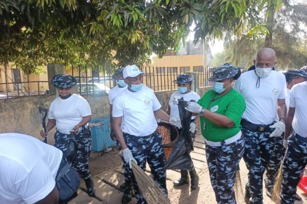 POLICE OFFICERS SWEEP STREETS IN ABUJA AS NATIONAL POLICE DAY CELEBRATIONS BEGIN.